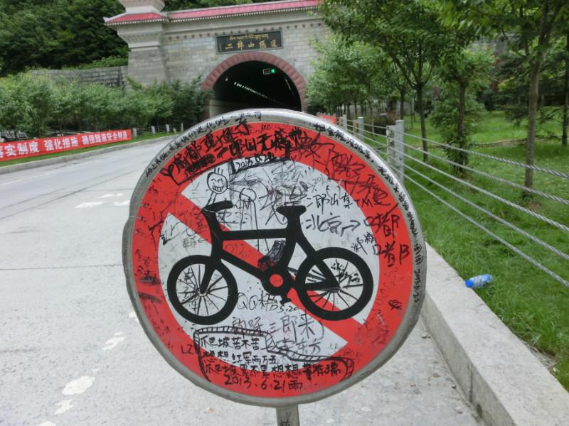 Graffiti on a signpost is an embarrassing fact in China. Foreigners are thinking what we have written down. 